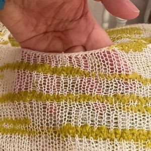 Ladies sweater size Med but fits like a large generous, & tank size XL.